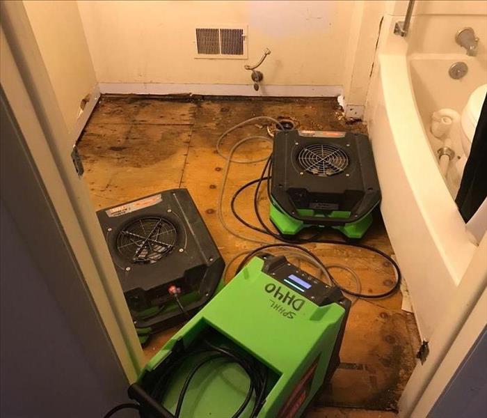 Exposed sub-floor due to water loss