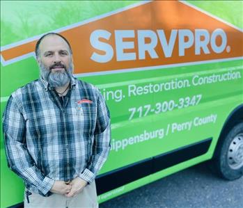 Owner Photo in front of green van